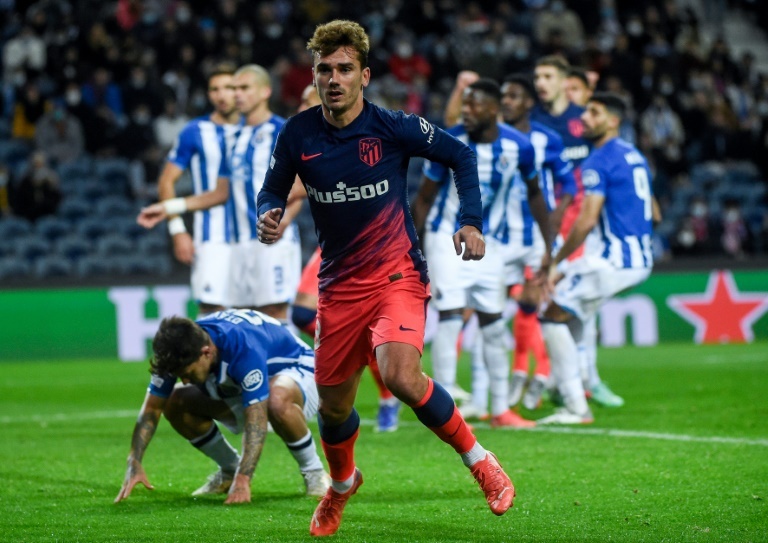 ï»¿Atletico qualify as Liverpool whole ideal Champions League institution stage