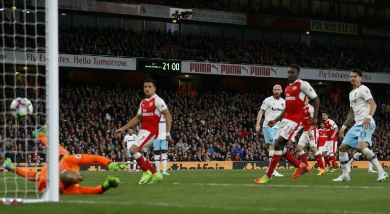 Ozil back on his game, says Wenger