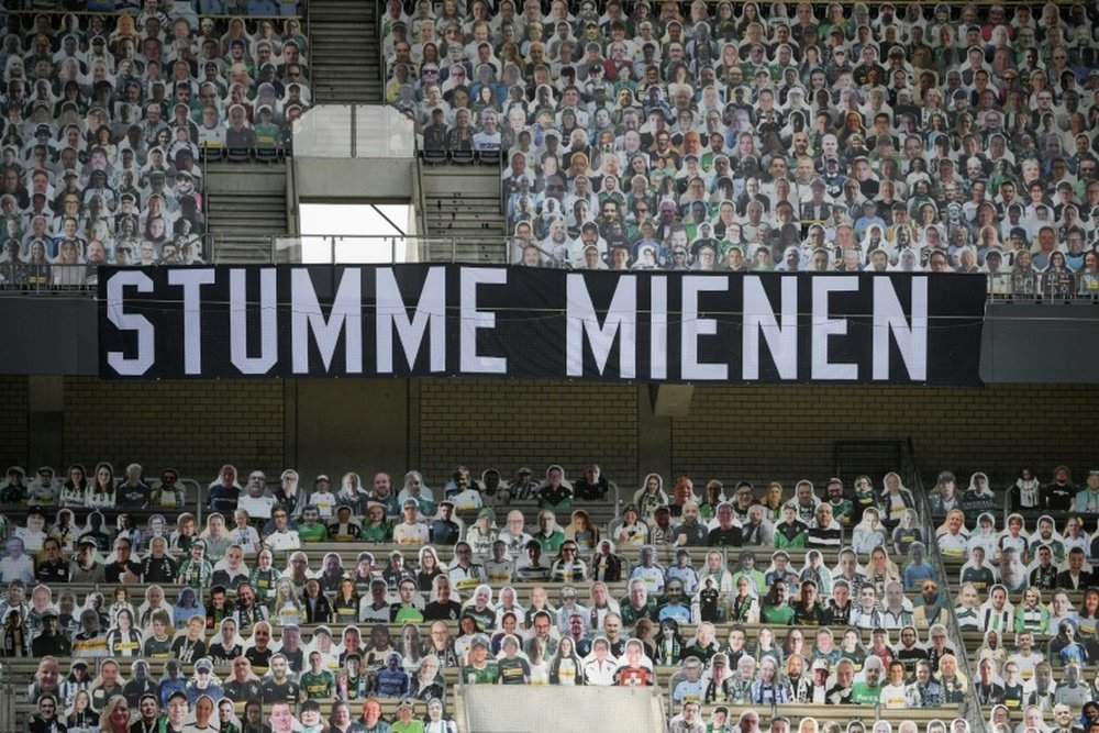 Gladbach's cardboard fans saw their side lose against Leverkusen. AFP