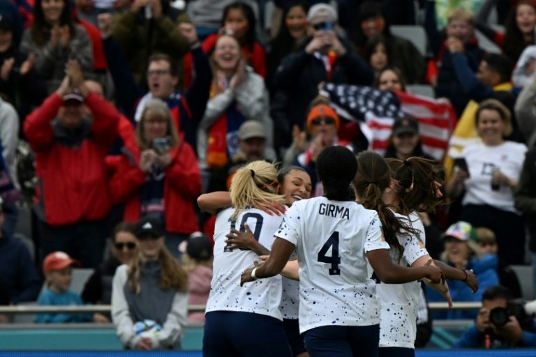 Stellar Smith scores twice as holders US ease to 3-0 win in World Cup opener