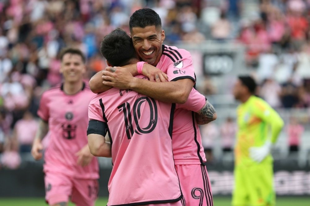 Suarez celebrated with Messi after scoring in Miami's 5-0 win over Orlando in MLS on Saturday. AFP