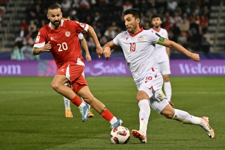 Debutants Tajikistan fight back to reach Asian Cup knockouts