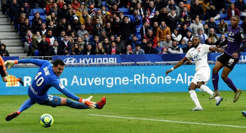 Toko Ekambi scores on Lyon debut as clubs remember Sala. AFP