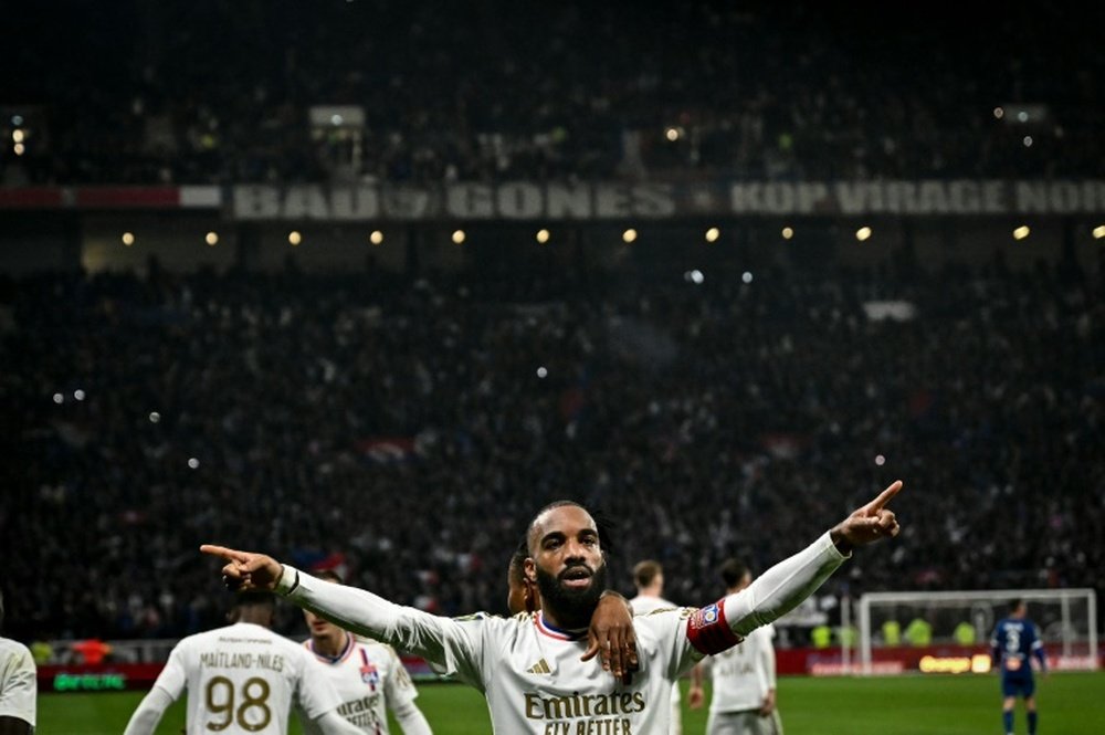 Lacazette's sharp reactions earned Lyon a precious 1-0 home victory. AFP