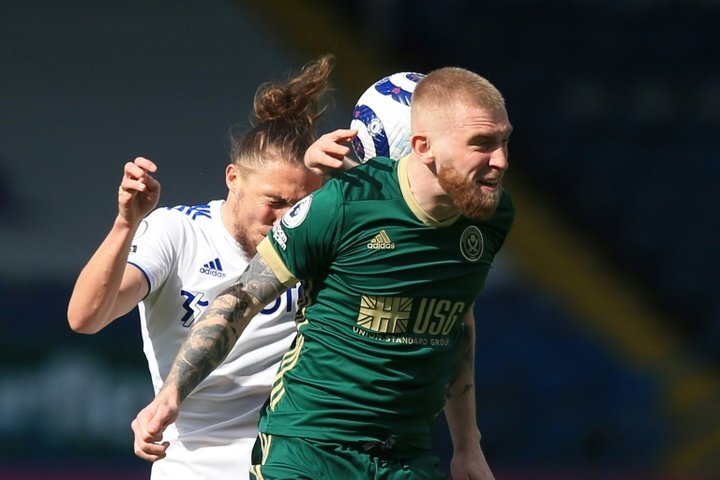 Sheffield United striker McBurnie cleared of assaulting pitch invader