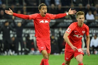 Yussuf Poulsen reacts during Monday's Bundesliga defeat at Moenchengladbach. AFP