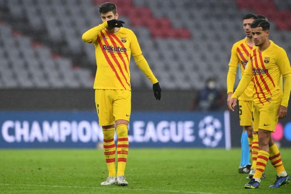 Barcelona crash out of Champions League as Benfica, Lille and Salzburg reach last 16. AFP