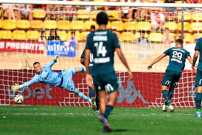 Monaco's perfect start to the Ligue 1 season ended on Sunday as Przemyslaw Frankowski's stoppage-time penalty earned Lens a 1-1 draw in searing heat in the principality.