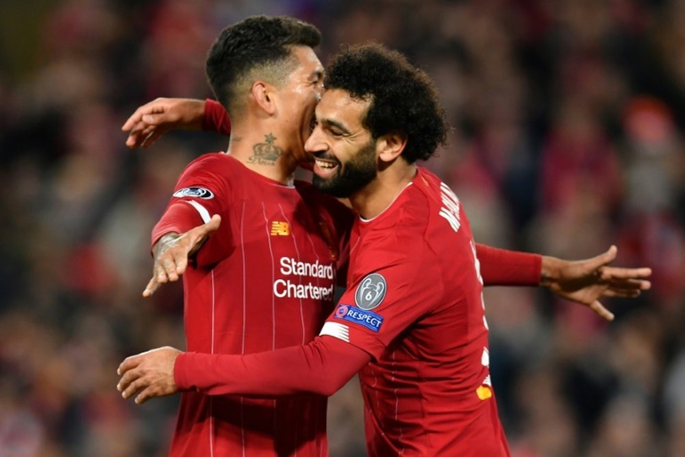 Mohamed Salah (right) came to the rescue with the winner in a 4-3 victory over Salzburg. AFP