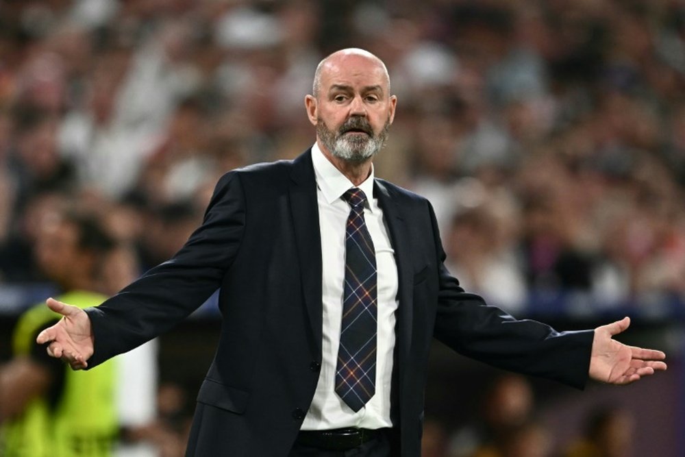 Clarke said he had to kick backsides and give a few cuddles after a 5-1 defeat to Germany. AFP