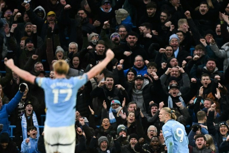 Haaland doubles up in Man City stroll as Chelsea are held by Palace