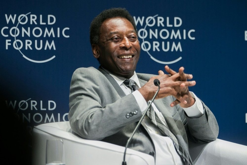 Pele says he is doing well after surgery. AFP