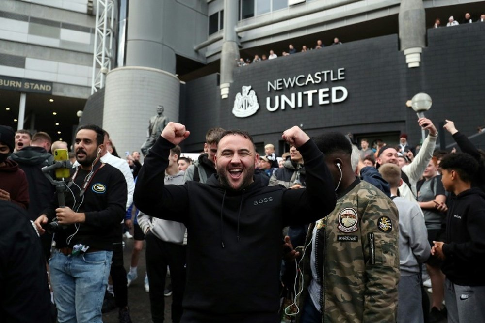 Newcastle fans are delighted by the takeover by a Saudi-led consortium. AFP