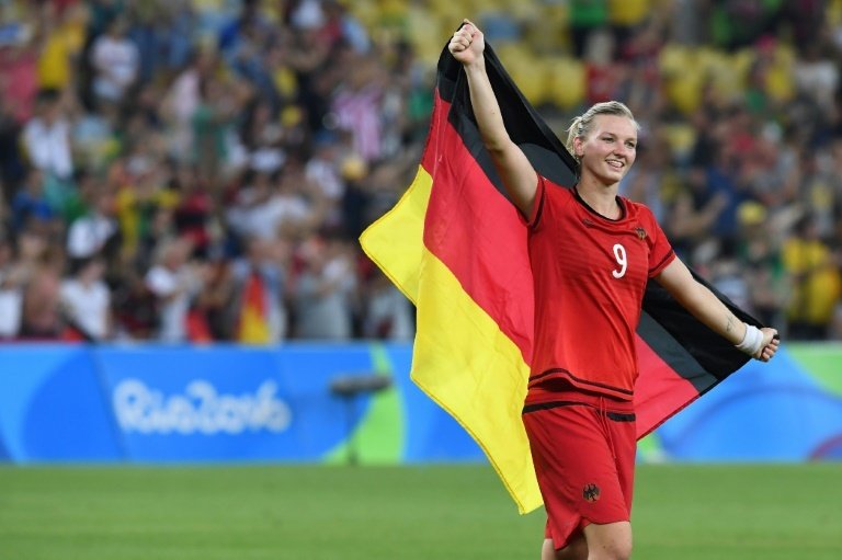 Wolfsburg Fem's Alexandra Popp has announced her retirement from international football. AFP