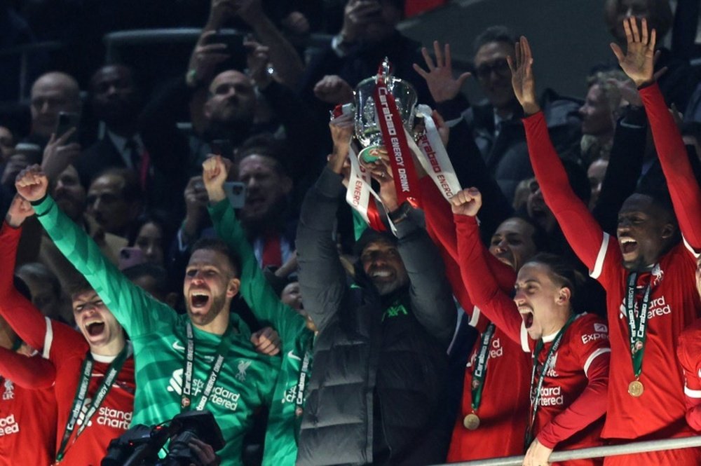 Virgil Van Dijk lifted his first trophy as Liverpool captain. AFP