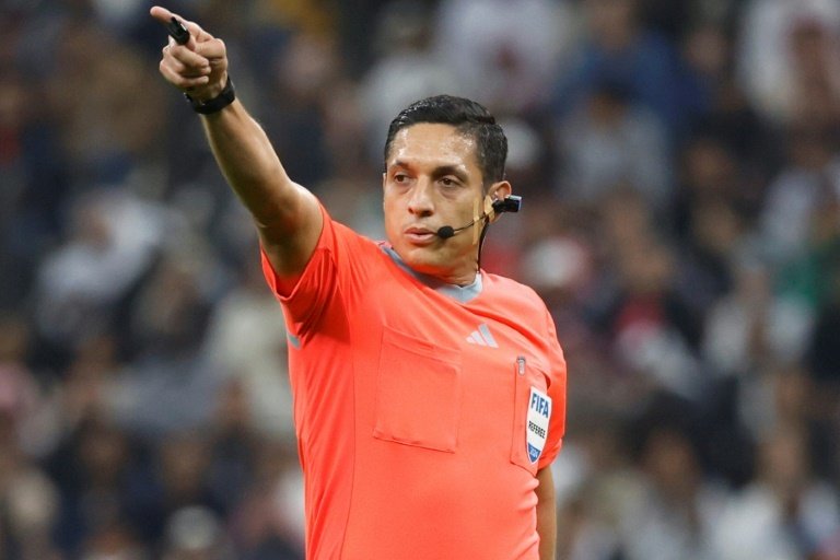 Referees will wear a small camera protruding from their earpiece in the Club WC. AFP
