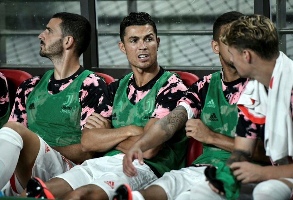 Cristiano Ronaldo (C) stayed on the bench during the exhibition match in Seoul last year. AFP