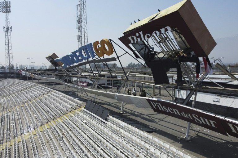 Five Chilean fans injured as advertising structure collapses. AFP