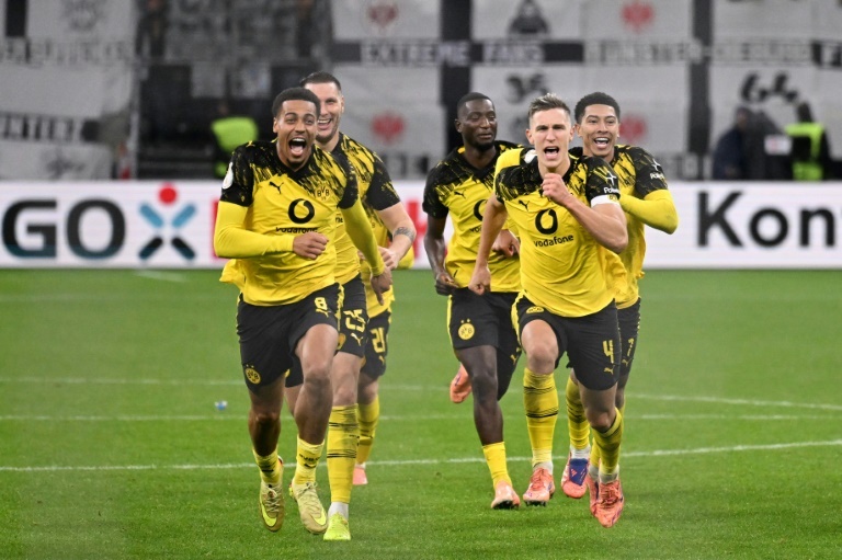 Dortmund knock Frankfurt out of German Cup on penalties
