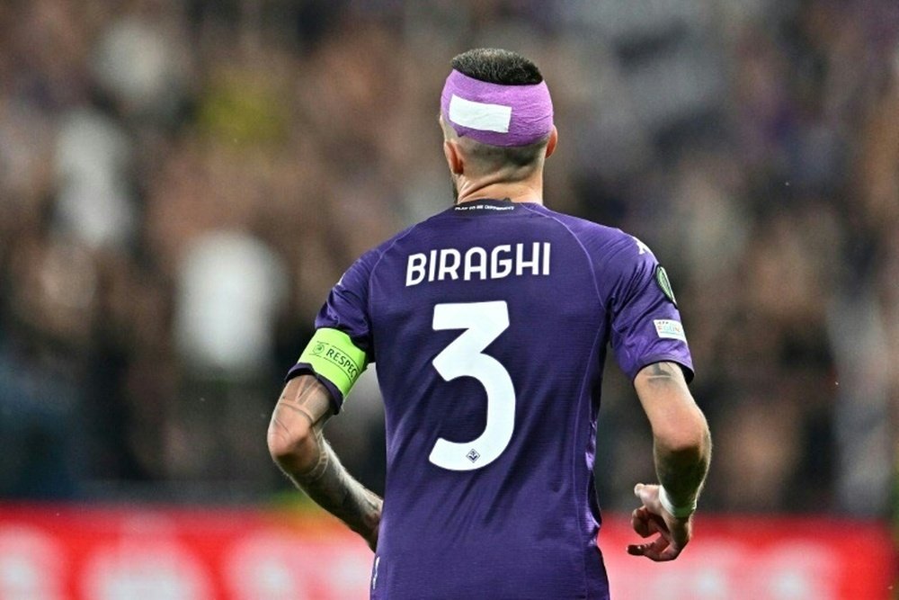 Biraghi needed eight stitches after being hit by an object thrown from the stands. AFP