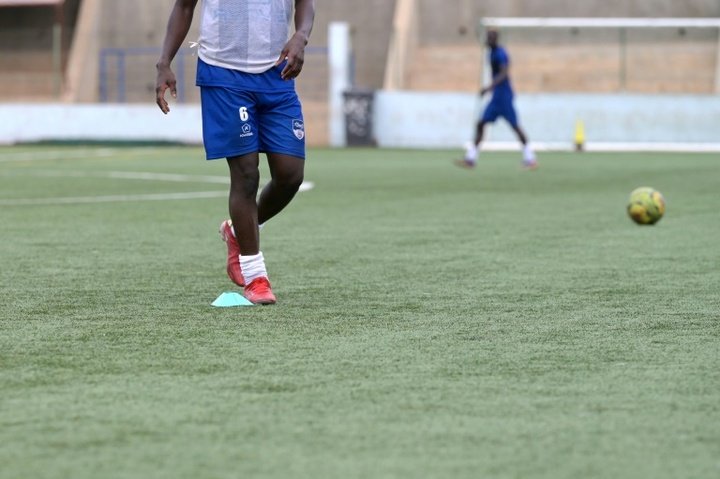 Young Senegalese football afficionados flock to artificial turf