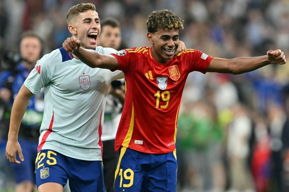 Lamine Yamal (R) became the youngest goalscorer in Euros history. AFP