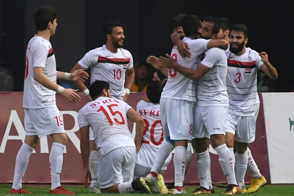 Syria's players aim to solely focus on football this month. AFP