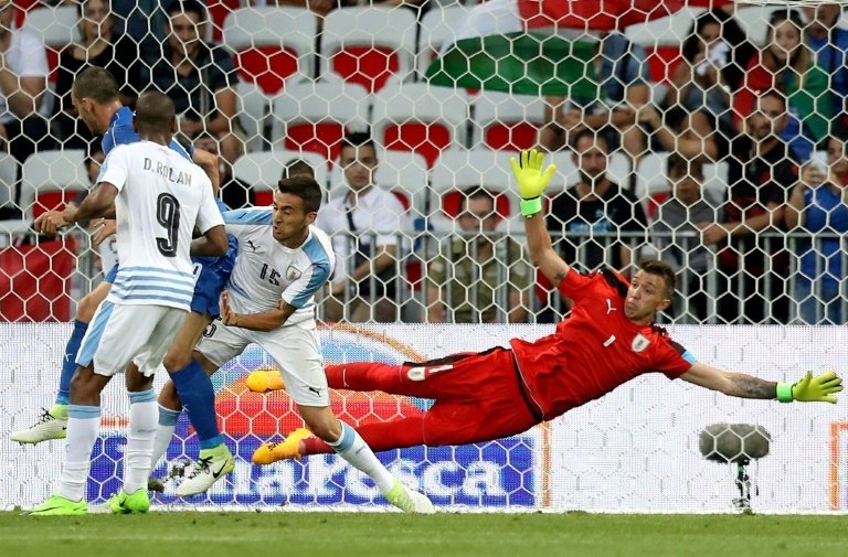 Italy cruise past Uruguay in football as Gimenez has disaster