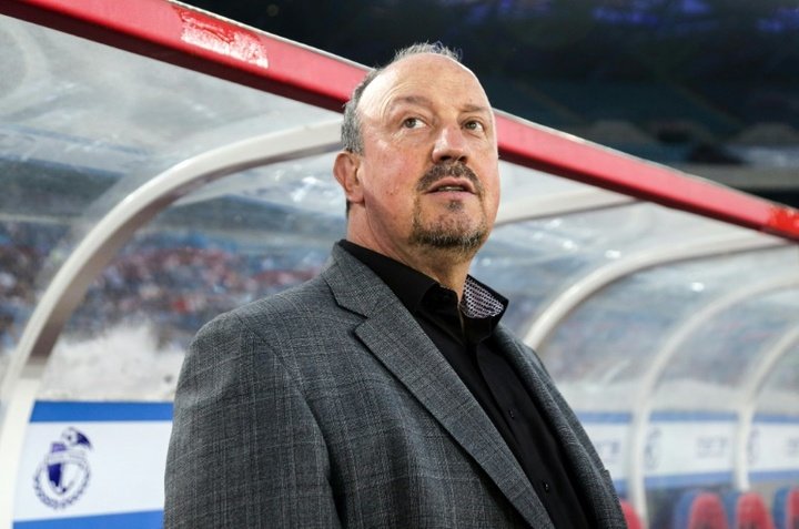 Beaten Benitez fumes in two-minute China press conference