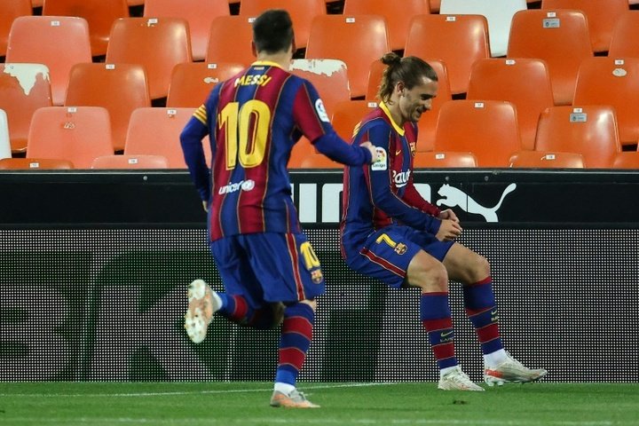 Messi double leads Barca to win over Valencia in five-goal thriller