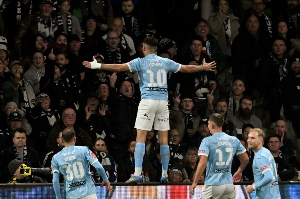 Yonatan Cohen (C) secured Melbourne City's victory in the A-League grand final. AFP