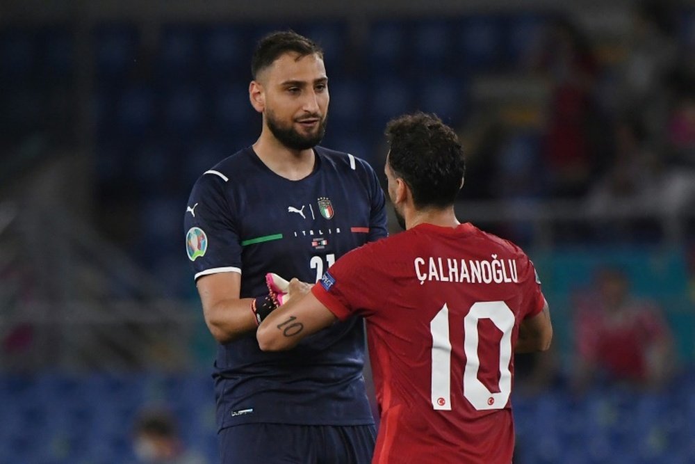 Calhanoglu looks to be on his way out of Milan, with Italy's Donnarummo soon to follow. AFP