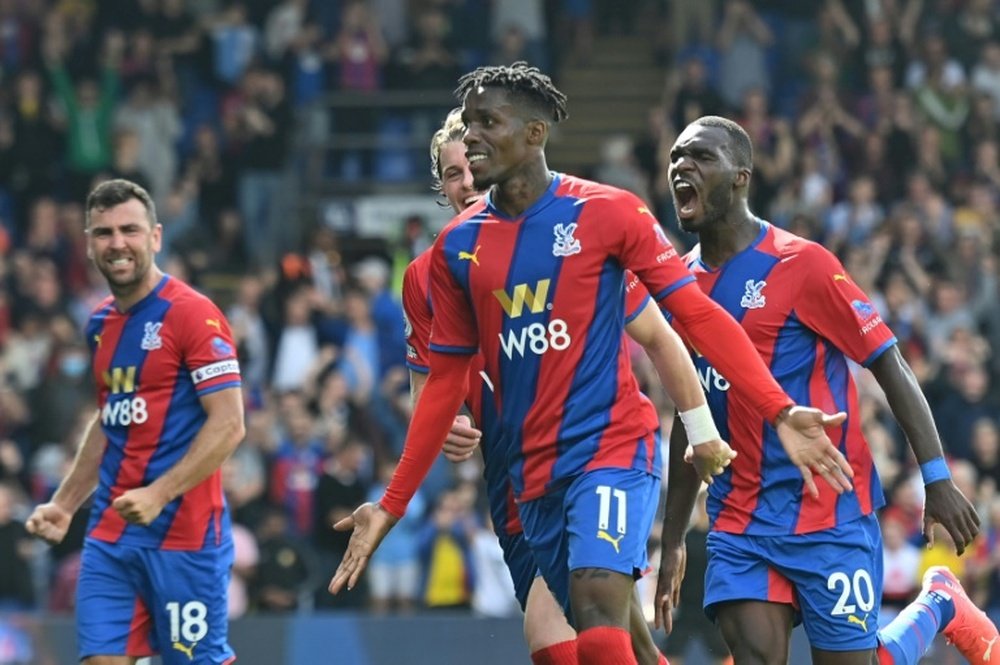 Wilfried Zaha (C) scored as Palace beat Tottenham. AFP