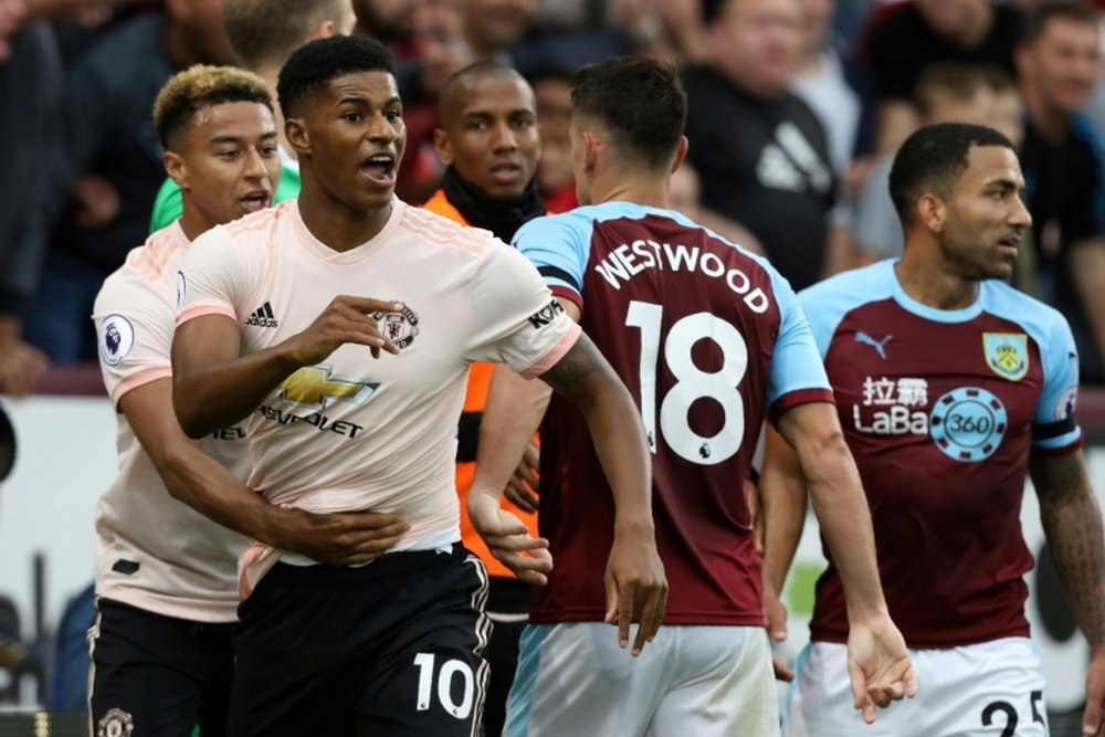 Marcus Rashford saw red after a challenge in United's win at Burnley. AFP