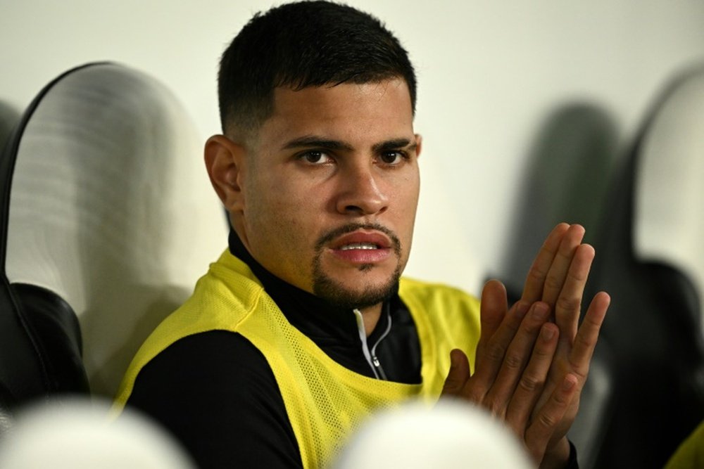 Guimaraes signs a new five year contract with Newcastle United. AFP