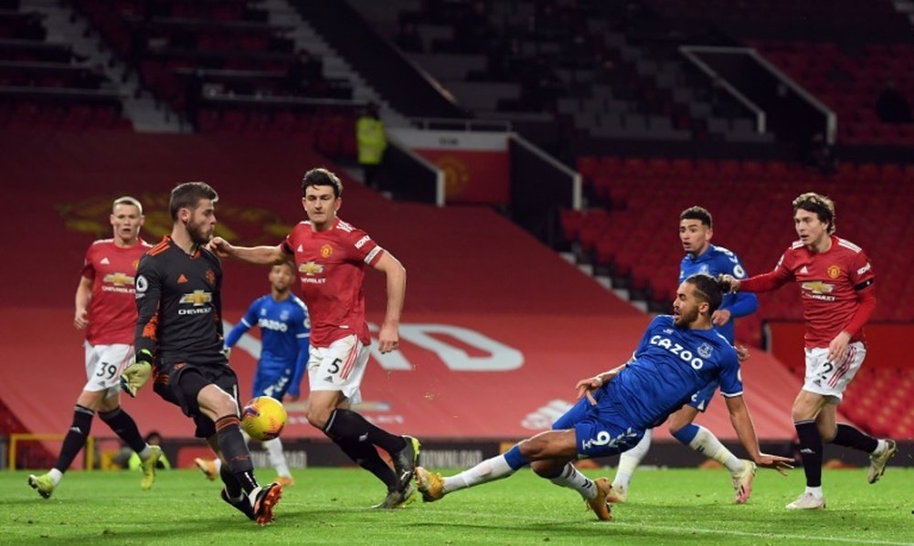 Dominic Calvert-Lewin (2R) got Everton a draw in the 95th minute. AFP