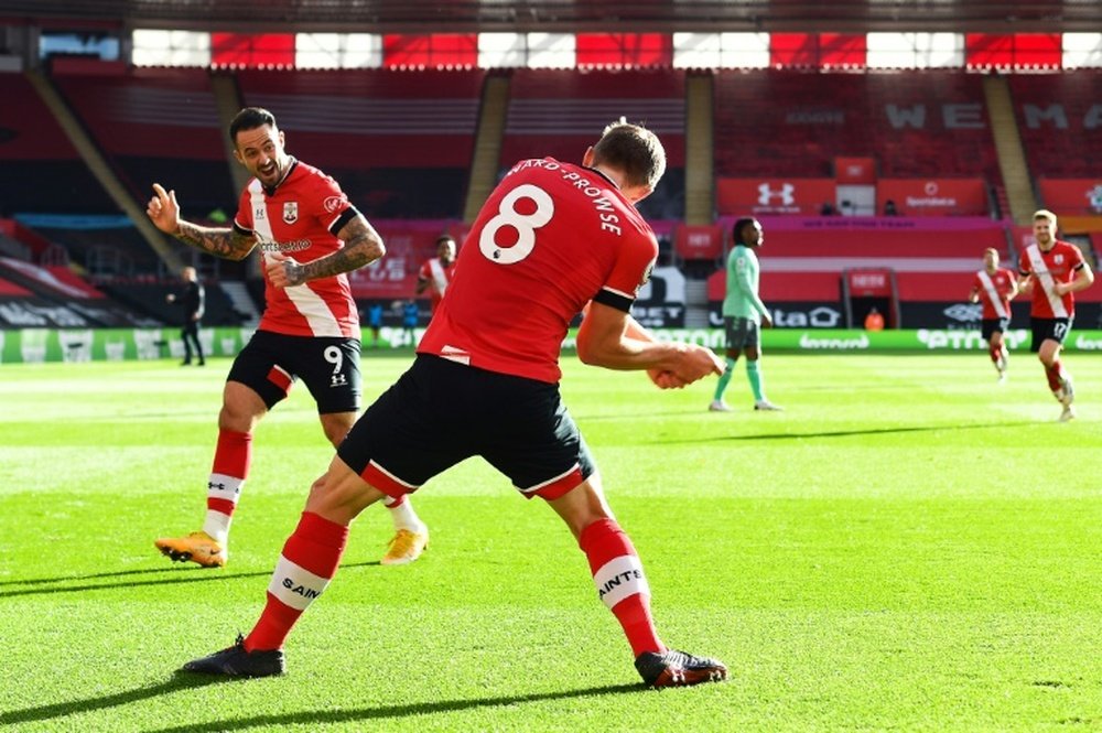 Southampton goal-scorer James Ward-Prowse (C) celebrates with Danny Ings (L). AFP