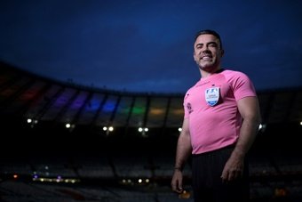 Removing 'camouflage,' Brazil football referee comes out. AFP
