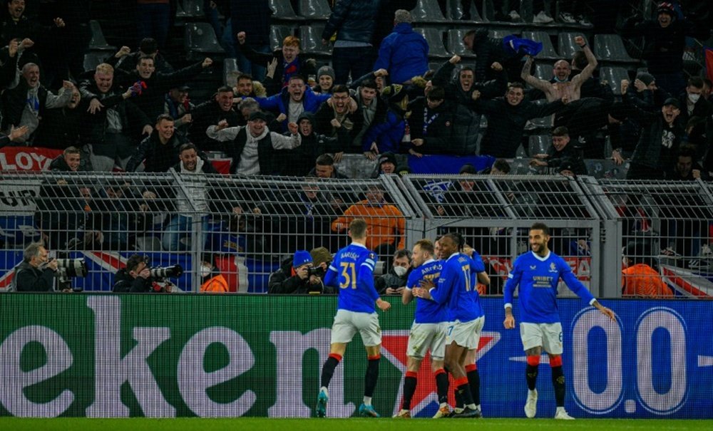 John Lundstram celebrates after putting Rangers 3-0 up in Dortmund. AFP