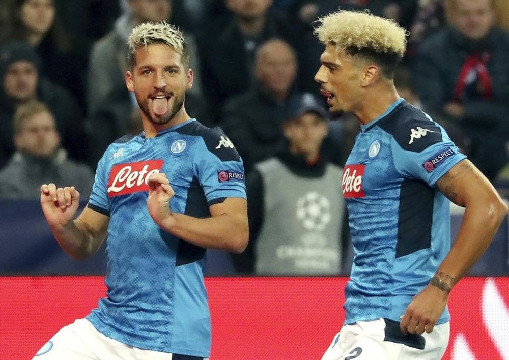Mertens' double helped Napoli win by the odd goal in five in Austria. AFP