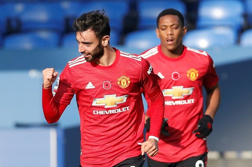 Manchester United midfielder Bruno Fernandes celebrates his equaliser against Everton. AFP