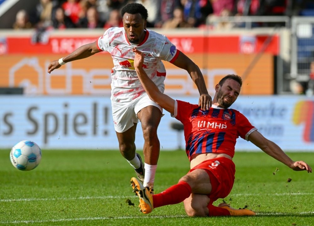 Openda (L) scored the only goal as Leipzig recorded a fourth Bundesliga win this season. AFP