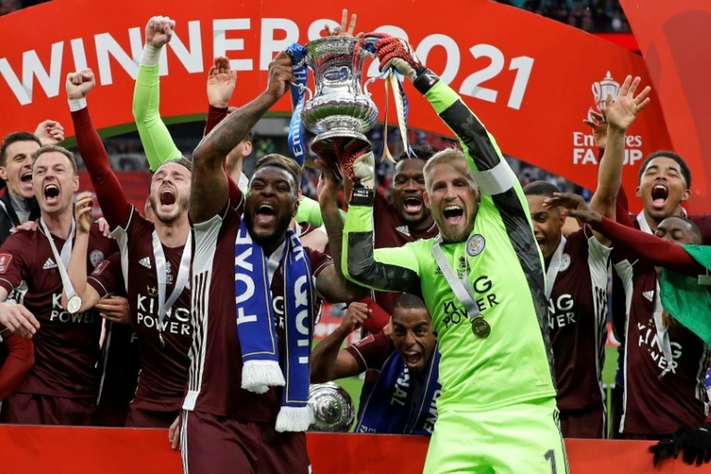 Leicester captain Kasper Schmeichel (centre, right) was crucial in Leicester's FA Cup win. AFP