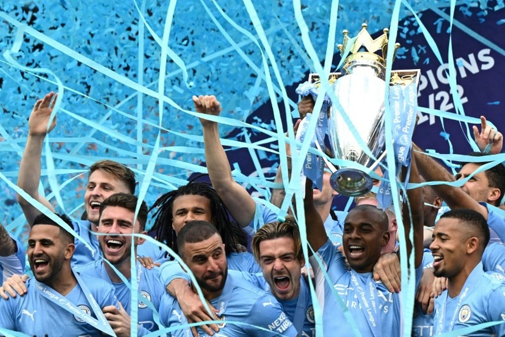 Manchester City celebrate winning the 2021/22 Premier League title. AFP
