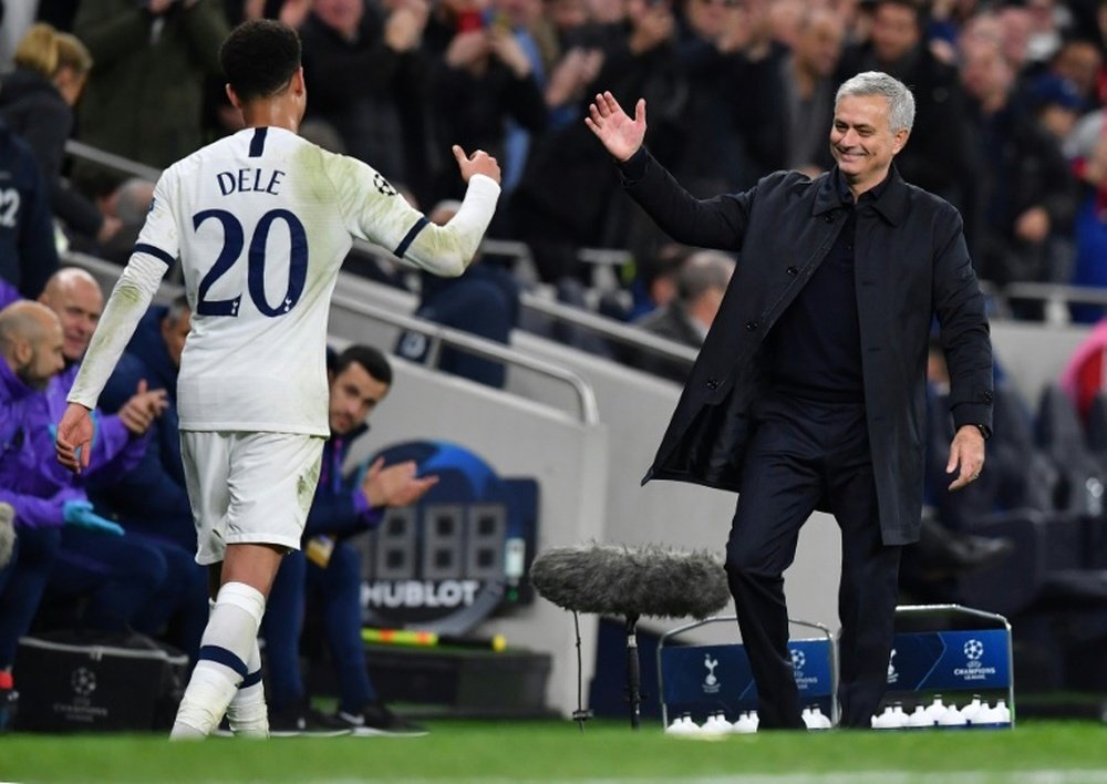 Tottenham survive scare to make last 16 on Mourinho's home bow. AFP