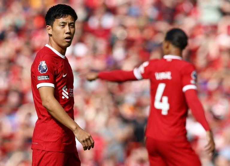 Endo (L) could make his first Liverpool start at Newcastle on Sunday. AFP