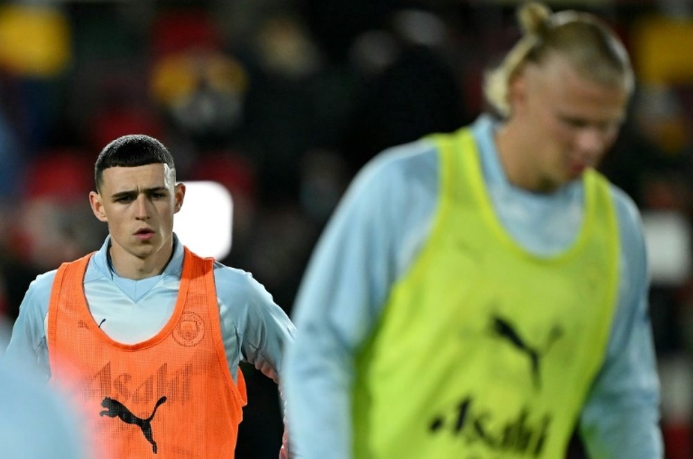 Phil Foden (L) has scored 14 goals in all competitions this season. AFP