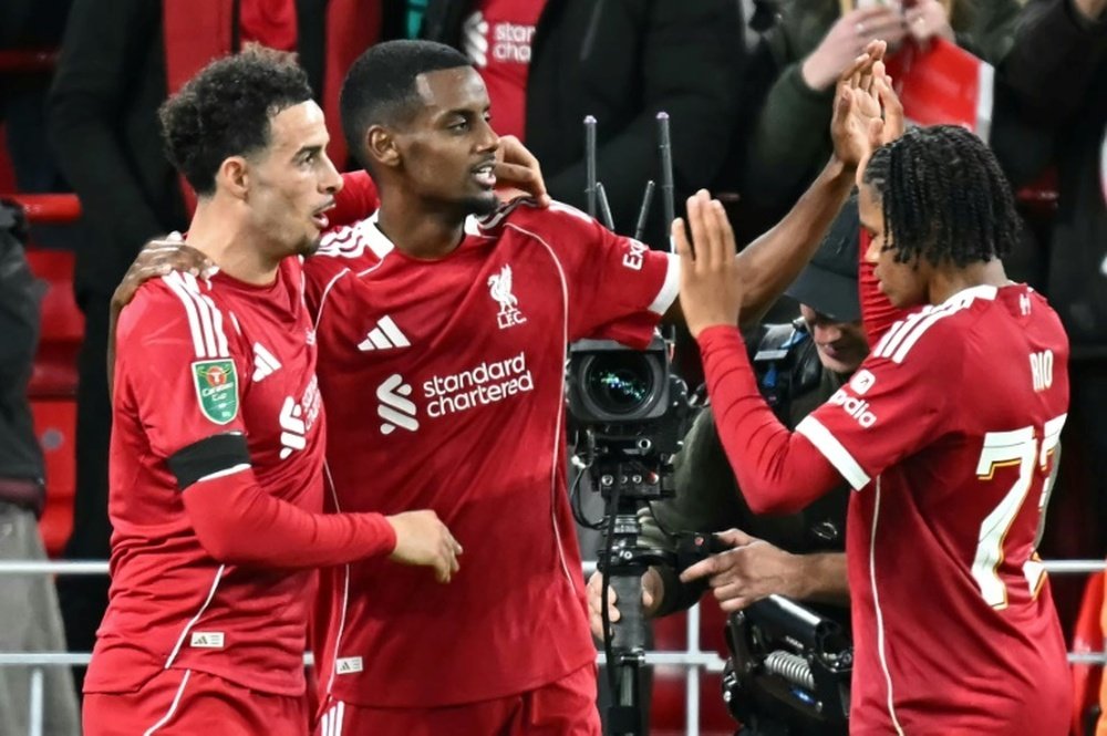 Liverpool striker Alexander Isak celebrated scoring his first goal for the club. AFP