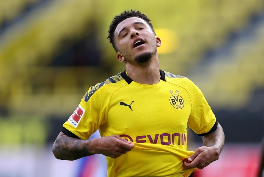 Sancho needs to be 'more grown up', says Dortmund teammate Can after haircut row. AFP