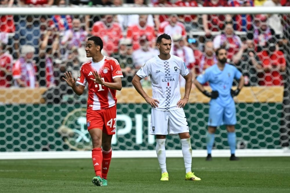 Musiala (L) hit a hat-trick on Sunday. AFP